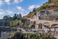 Manarola ITALY - 2 August 2023 - Viewpoint and hill with stone wall with pathway for people Royalty Free Stock Photo