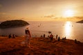 Viewpoint Laempromthep, Phuket, Thailand. Silhouette, Tourists come to watch the sunset and Sailboat tour to watch sunset in the