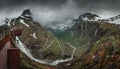 Viewpoint platform of mountain road Trollstigen winding through landscape with waterfall and valley of Trollveggen in Norway Royalty Free Stock Photo
