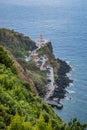 Viewpoint for Ponta do Arnel Lighthouse in cliff with winding road by the sea, SÃ£o Miguel - Azores PORTUGAL Royalty Free Stock Photo