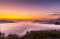Viewpoint of the sea mist over the Mekong Rive in Laos and beautiful sunrise viewpoint,nature,travel at Phu Huay Isan,Nong Khai,