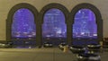 View at the heart of finance world of Doha night timelapse thought the three arches