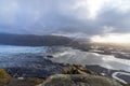 Viewpoint to a massive glacier with clouds and ray lights