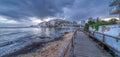 Views of Albufereta and Alicante from the wooden walkway next to the Roman fish farms Royalty Free Stock Photo