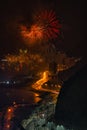 Views of Alicante city at night during the celebration of the night of San Juan, fireworks festival. Night scene full of lights