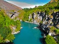 Views of the azure river from the mountaintops.