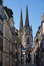 Views between buildings of the Sainte-Marie Cathedral of Bayonne during a sunny day