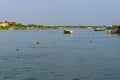 Views of the Chao Phraya River with boats and bridges in the background