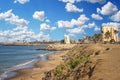 Views of the coastline of Dakar, Senegal, Africa. It is a beautiful long beach and in the background you can see buildings and Royalty Free Stock Photo