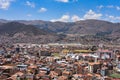 Views of Cusco airport and the San Sebastien district from Rumiwasi. Cusco, Peru