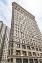 Views of the famous Flatiron building at the corner of 5th Ave and 23rd St in New York, USA Royalty Free Stock Photo