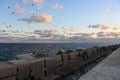 Views of the Fuengirola dike in the harbor at sunset