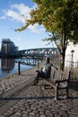 Views of Leith, Edinburgh, Scotland including a statue of Sandy Irvine Robertson OBE sat on a bench by the waterside