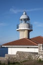 Views of the lighthouse of Punta del Torco de Afuera in Suances, Cantabria, Spain.