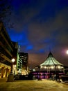 Views of London at night seating at South bank