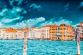 Views of the most beautiful canal of Venice - Grand Canal water streets, boats, gondolas, mansions along. Italy Royalty Free Stock Photo