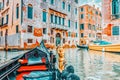 Views of the most beautiful channels of Venice, front of the boat the gondola, floating along the canal.Italy