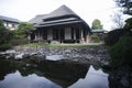 Views of an old Japanese style house with its garden and a small lake in Yanagawa, Fukuoka, Japan. Royalty Free Stock Photo