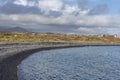 Views of the pebble beach, Playa de Los Colmenares near Montana Amarilla and Amarilla Golf resort, Tenerife, Canary Islands Royalty Free Stock Photo