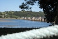 Views of Puente Las Mazas over the Rio Escudo in San Vicente de la Barquera, Cantabria, Spain. Royalty Free Stock Photo