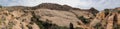 Views of sandstone and lava rock mountains and desert plants around the Red Cliffs National Conservation Area on the Yellow Knolls