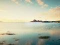 Views of the sea shore, overlooking the typical cottages of the coast, in Norway.