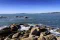 Views of the sea and the stones from the Hermitage of La Lanzada in Sanjenjo, Pontevedra, Galicia, Spain Royalty Free Stock Photo