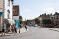 Views of shoppers on Market Place in Glastonbury, Somerset in the UK