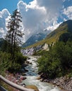 Views showing High mountains, rivers, forests, valleys and the alpine landscape of La Fouly in the Canton of Valais, Switzerland.