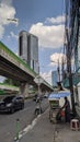 views of skyscrapers and flyovers with the life of street vendors in the city of Jakarta