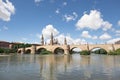 Views of the stone bridge and the basilica del Pilar next to the Ebro river in Zaragoza, Aragon, Spain Royalty Free Stock Photo