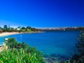 views of Sydney Harbour with views of camp cove beach NSW Australia blue skies clear turquoise waters of the bay white sandy beach Royalty Free Stock Photo