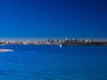 views of Sydney Harbour NSW Australia blue skies clear turquoise waters CBD in the background Royalty Free Stock Photo