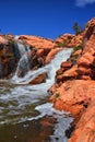 Views of Waterfalls at Gunlock State Park Reservoir Falls, In Gunlock, Utah by St George. Spring run off over desert erosion sands Royalty Free Stock Photo