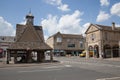 Views of the Witney Clock Tower and Witney Town Council Buildings at Buttercross in Witney, Oxfordshire in the UK