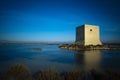 Vigilance Tower in natural park of Santa Pola surrounded by water