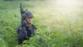 Female Thai soldier surveying during field training