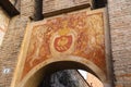 Antique painting on old arch in Vignola castle, Italy