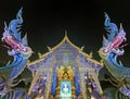 Viharn and dragons at Wat Rong Suea Ten Blue temple, Chiang Rai, Thailand