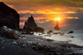 Vik and Basalt Columns at sunset, Black Sand Beach in Iceland