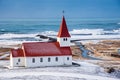 The Vik I Myrdal church at the top of the hill offering picturesque images of the atlantic ocean and the village of vik in