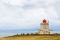 Tourists near Dyrholaeyjarviti Lighthouse