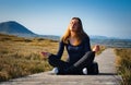 Viki meditating at Connemara in the mountains