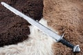 Viking Age sword on sheep fur Royalty Free Stock Photo