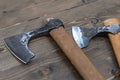 Viking battle ax close up on wooden background