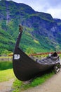 Viking boat at fjord shore Gudvangen village
