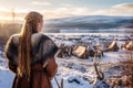 Viking cute girl snow settlement. Generate Ai
