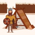 Viking with helmet with horns and axe, shield near lumbermill. Royalty Free Stock Photo