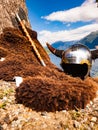 Viking helmet and weapons on fjord shore, Norway Royalty Free Stock Photo