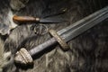 Viking sword and knife on a fur